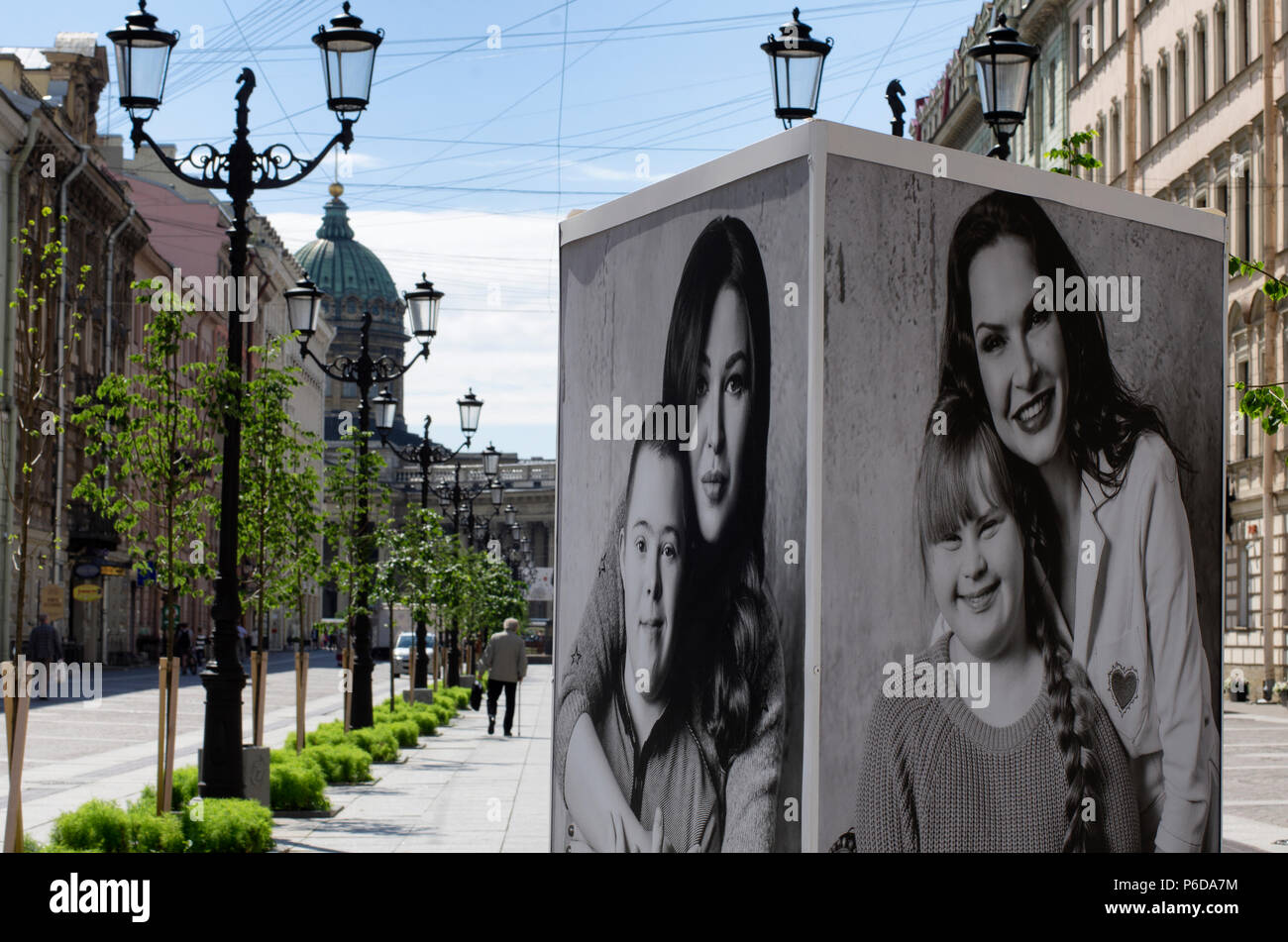 St. Petersburg, Russia - July 23, 2017: Posters with a charity project to help children with Down's syndrome, in which celebrities from Russia Stock Photo