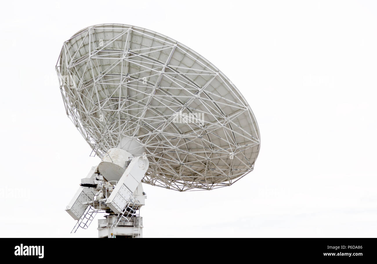 Radio telescope dish pointing at the sky Stock Photo