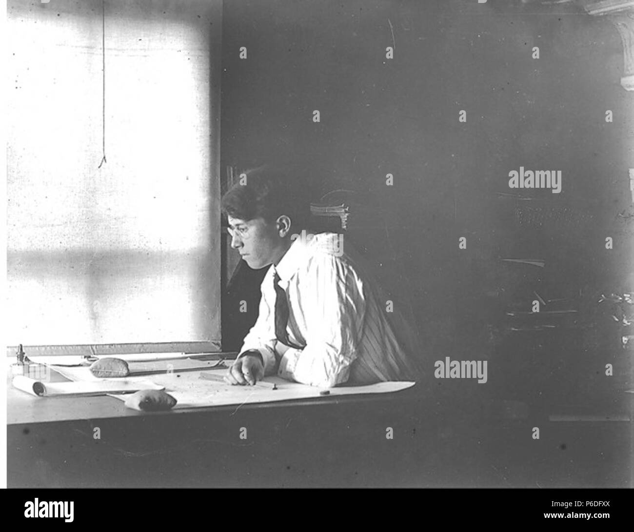 . English: G. Verne Bagley in engineer's office, Fort Lawton, Washington, 1905 . English: On verso of image: Verne Text from Kiehl log: G.V. Bagley office at Ft. Lawton. 1905. Album 1.060 Subjects (LCTGM): United States. Army--People--Washington (State)--Seattle Subjects (LCSH): Bagley, G. Verne; Military engineers--Washington (State)--Fort Lawton (Seattle)  . 1905 49 G Verne Bagley in engineer's office, Fort Lawton, Washington, 1905 (KIEHL 222) Stock Photo
