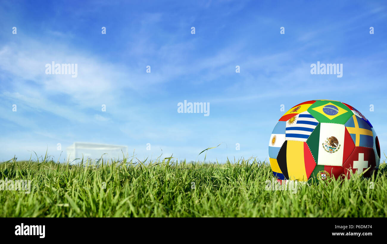 Soccer ball with international country flag of russian sport event groups. Realistic football on goal post field over blue sky background. Includes me Stock Photo