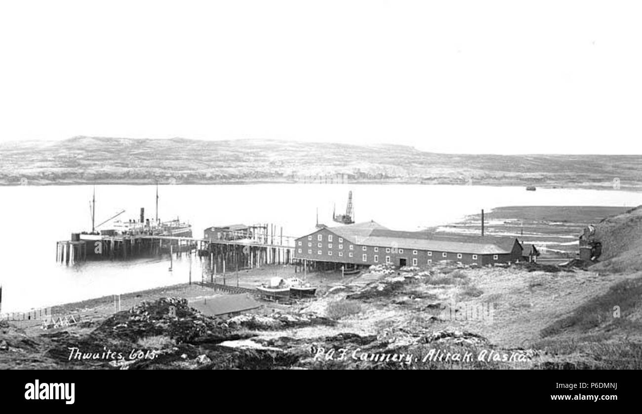 . English: Pacific American Fisheries cannery, Alitak (now Akhiok), ca. 1912 . English: Caption on image: P.A.F. Cannery, Alitak, Alaska PH Coll 247.969 Akhiok is located at the southern end of Kodiak Island at Alitak Bay. The original village of Kashukugniut was occupied by Russians in the early 19th century. The community was a sea otter hunting settlement, located at Humpy Cove. The name Akhiok was reported in the 1880 Census. In 1881, residents relocated to the present site at Alitak Bay. A post office was established in 1933, and remained open until 1945. Today, Akhiok is a Sugpiaq Eskimo Stock Photo