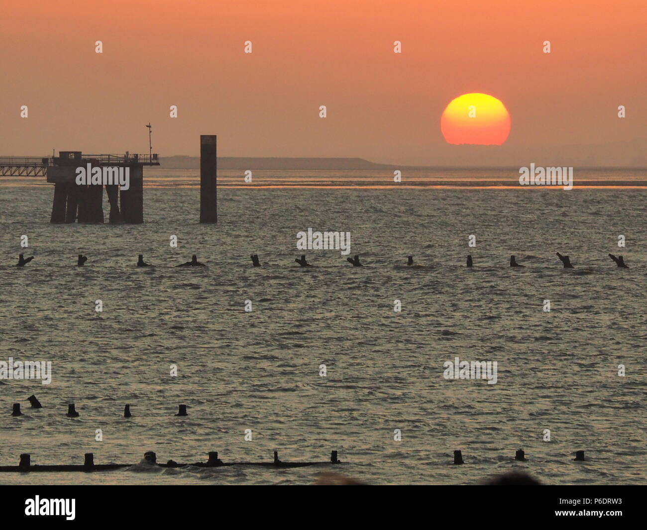 Sheerness, Kent, UK. 29th June, 2018. UK Weather: the sunset in Sheerness, Kent. Credit: James Bell/Alamy Live News Stock Photo