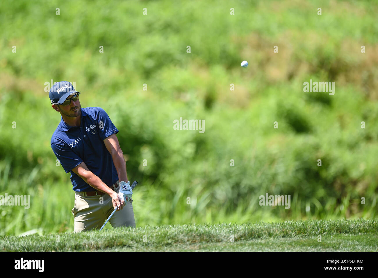 JUNE 29, 2018 - Andrew Landry (USA) chips out of trouble and onto the tenth green during the second round at the 2018 Quicken Loans National at the Tournament Players Club in Potomac Maryland. Stock Photo