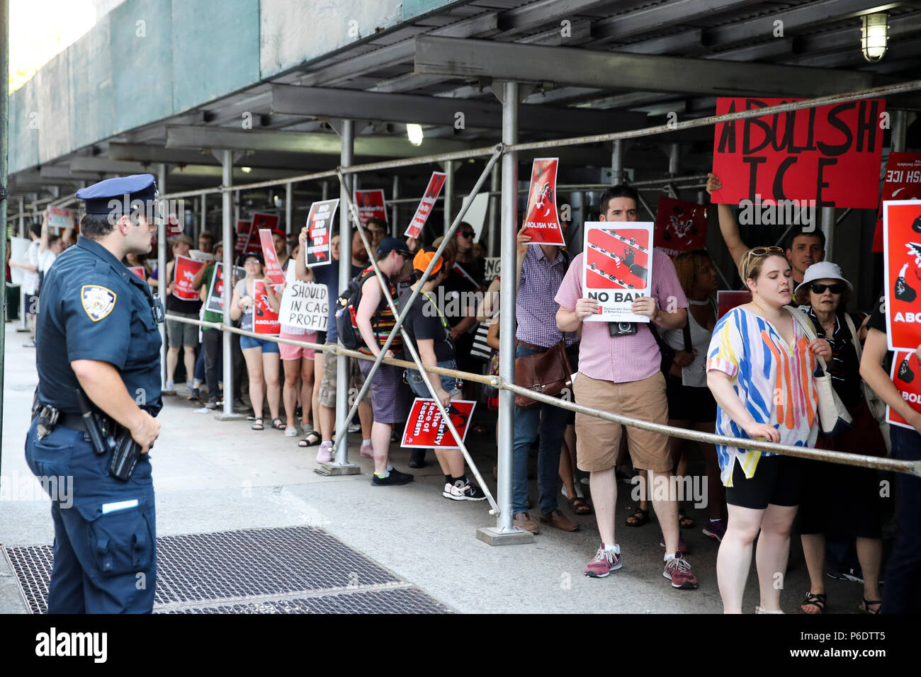 New York, USA. 29th June, 2018. People take part in the 'March to Abolish ICE' protest in New York, the United States, June 29, 2018. Hundreds of people took part in the march on Friday, calling for the complete abolition of Immigration and Customs Enforcement (ICE) and an end to mass incarceration to illegal immigrants. Credit: Wang Ying/Xinhua/Alamy Live News Stock Photo