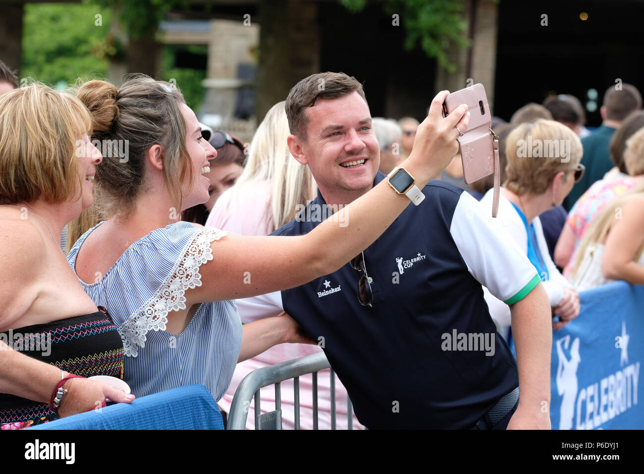 Newport, UK, 30 June 2018. Celebrity Cup golf tournament - Celtic Manor, Newport, Wales, UK - Saturday 30th June - Actor Danny O'Carroll playing for Team Ireland poses with fans at the Celebrity Cup. Photo Steven May / Alamy Live News Stock Photo