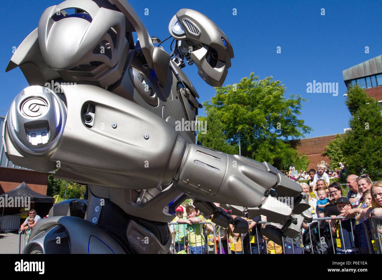 Futuristic Robotic entertainers at the Lancashire Science Festival where Titan the Robot partially-mechanised robot costume developed by the British company Cyberstein Robots performed a fun filled show to hundreds of spectators at the Lancashire University science event. Stock Photo
