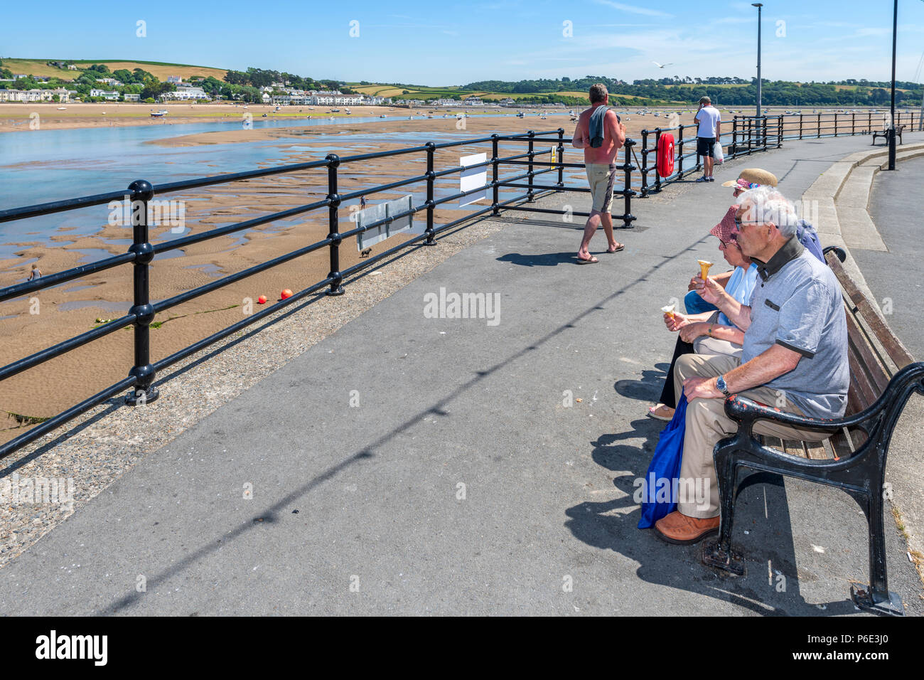 Appledore Quay, UK, 30 June 2018. UK Weather - Another hot and humid day in North Devon, as the heatwave continues, holidaymakers enjoy an ice-cream and the panoramic views over the Torridge estuary at Appledore. Credit: Terry Mathews/Alamy Live News Stock Photo