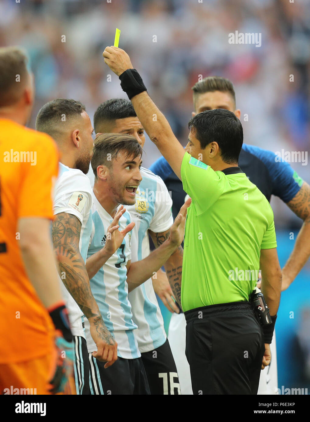 (180630) -- KAZAN, June 30, 2018 (Xinhua) -- Nicolas Tagliafico (3rd L) of Argentina receives a yellow card from the referee during the 2018 FIFA World Cup round of 16 match between France and Argentina in Kazan, Russia, on June 30, 2018. (Xinhua/Lu Jinbo) Stock Photo