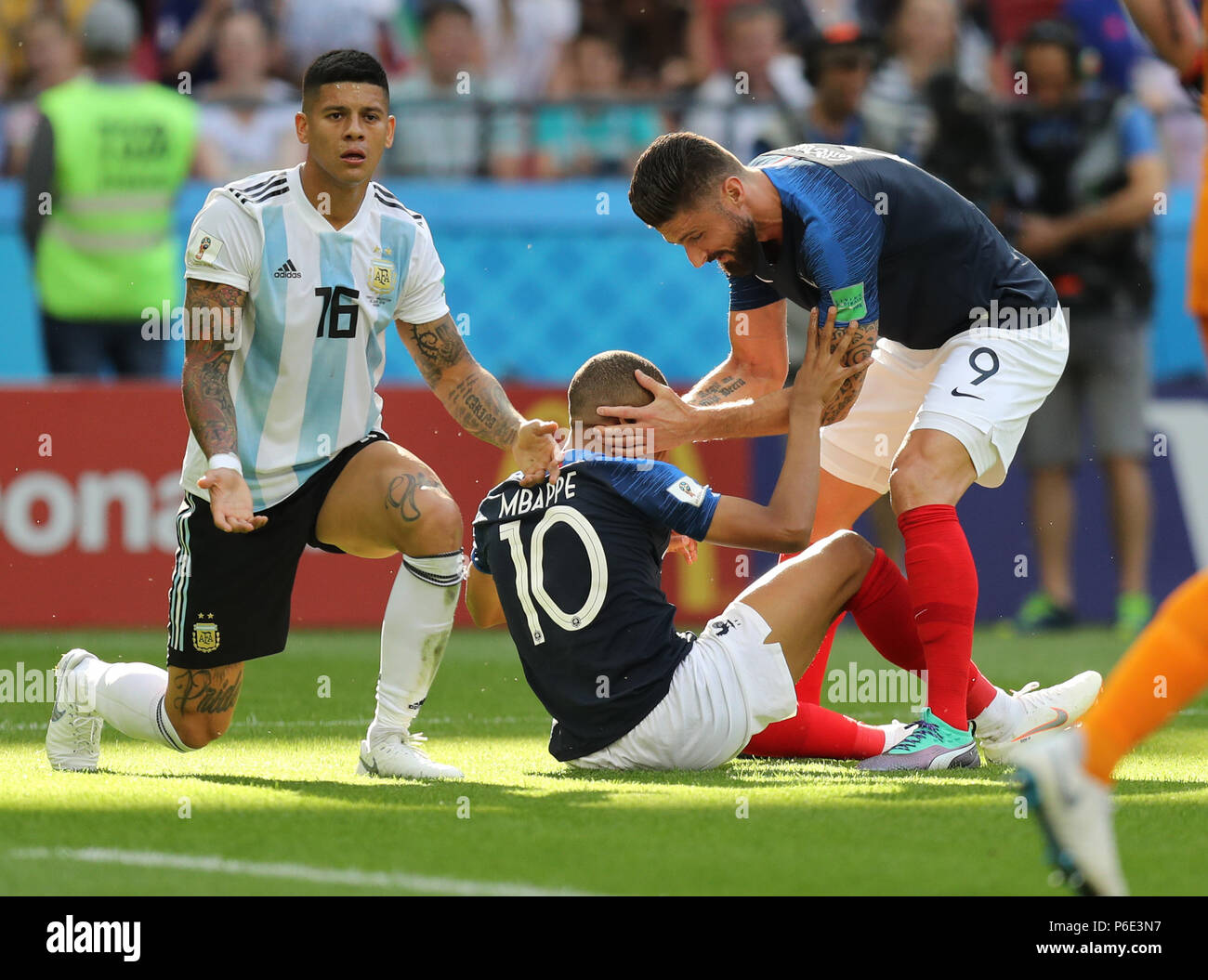 (180630) -- KAZAN, June 30, 2018 (Xinhua) -- Kylian Mbappe (C) of France celebrates with teammate Olivier Giroud (R) after being awarded a penalty kick after a foul by Marcos Rojo of Argentina during the 2018 FIFA World Cup round of 16 match between France and Argentina in Kazan, Russia, on June 30, 2018. (Xinhua/Lu Jinbo) Stock Photo