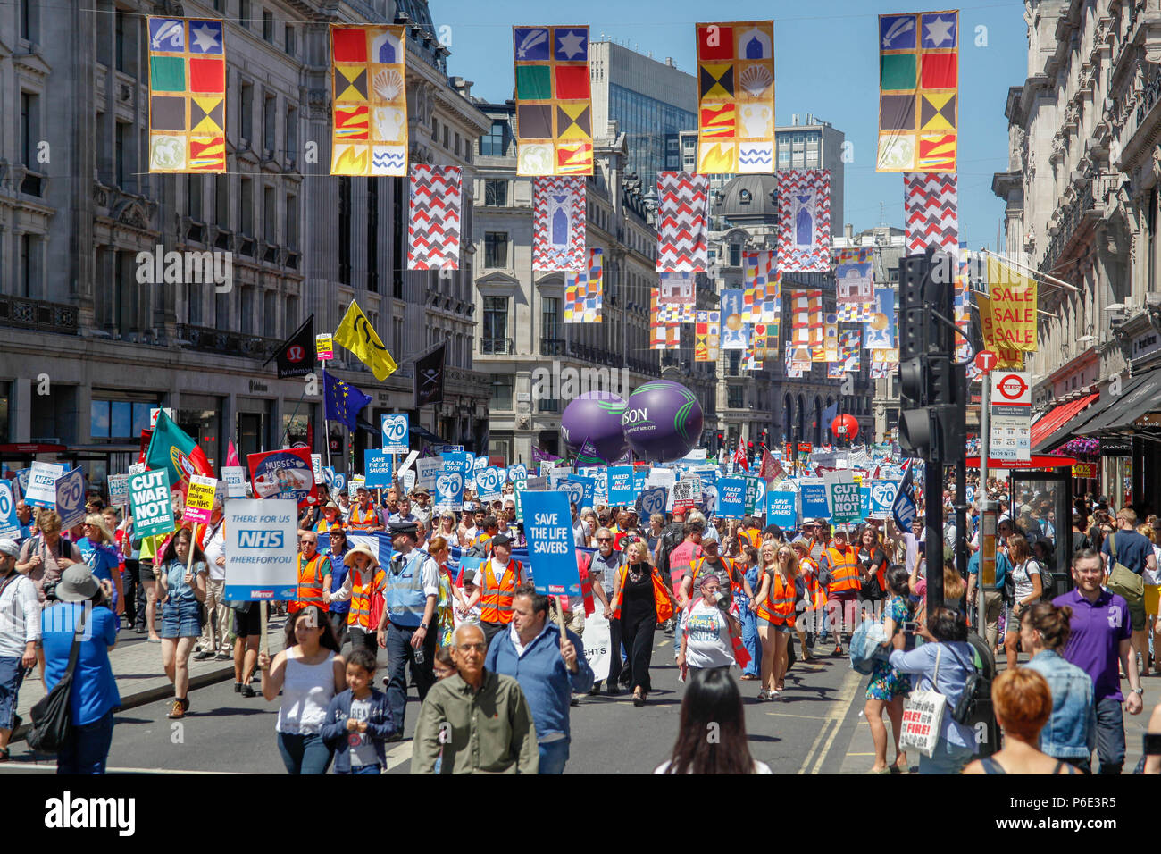 London, UK, 30 June 2018. Demonstrators at the NHS's 70th Birthday March Credit: Alex Cavendish/Alamy Live News Stock Photo