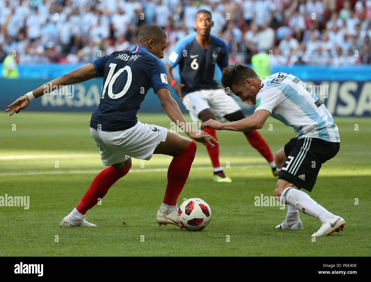 (180630) -- KAZAN, June 30, 2018 (Xinhua) -- Kylian Mbappe (L) of France vies with Nicolas Tagliafico (R) of Argentina during the 2018 FIFA World Cup round of 16 match between France and Argentina in Kazan, Russia, June 30, 2018. (Xinhua/Li Ming) Stock Photo