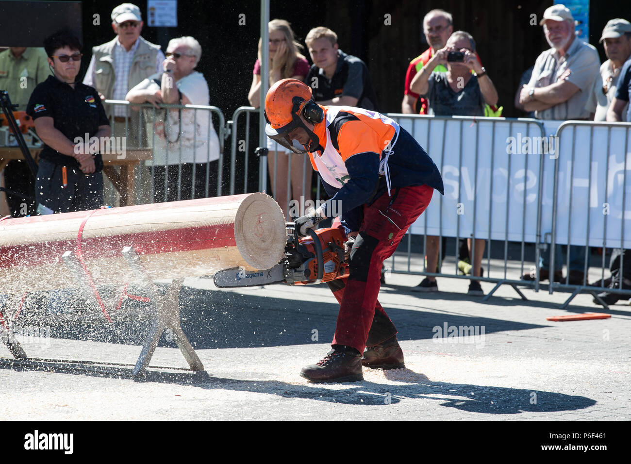 Seesen, Germany. 30th June, 2018. Bjarne Meyer, starter in the Chainsaw Cup, completes the discipline 'Kettenwechsel' (lit. chain changing). Arround 55 participants are competing for the title of 'Niedersaechsischer Waldarbeitsmeister' (lit. Lower Saxony Forestry Champion). Credit: Swen Pförtner/dpa/Alamy Live News Stock Photo