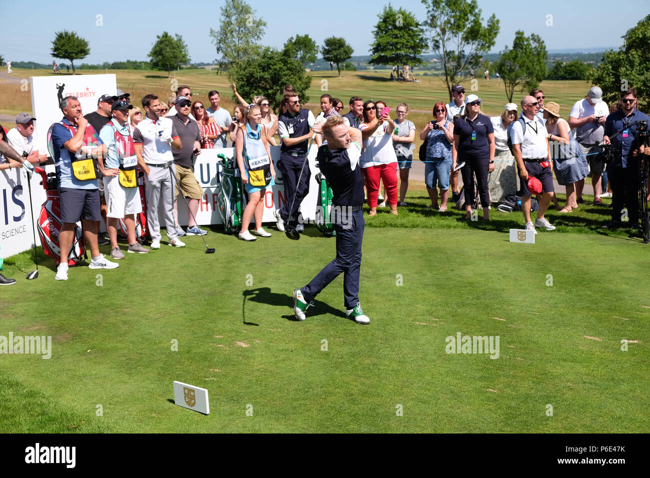 Celebrity Cup golf Celtic Manor, Newport, Wales, June 2018 - Singer Ronan Keating tees off at the sixth hole watched by a large crowd off spectators - Photo Steven May / Alamy Live News Stock Photo