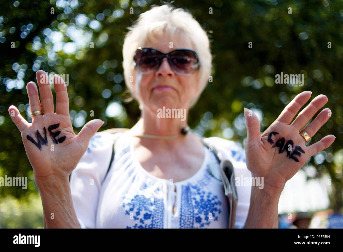 Washington, DC, USA. 30th June, 2018. Protestors gather in Lafayette Park, across from the White House, for the Families Belong Together rally. Credit: Michael Candelori/ZUMA Wire/Alamy Live News Stock Photo