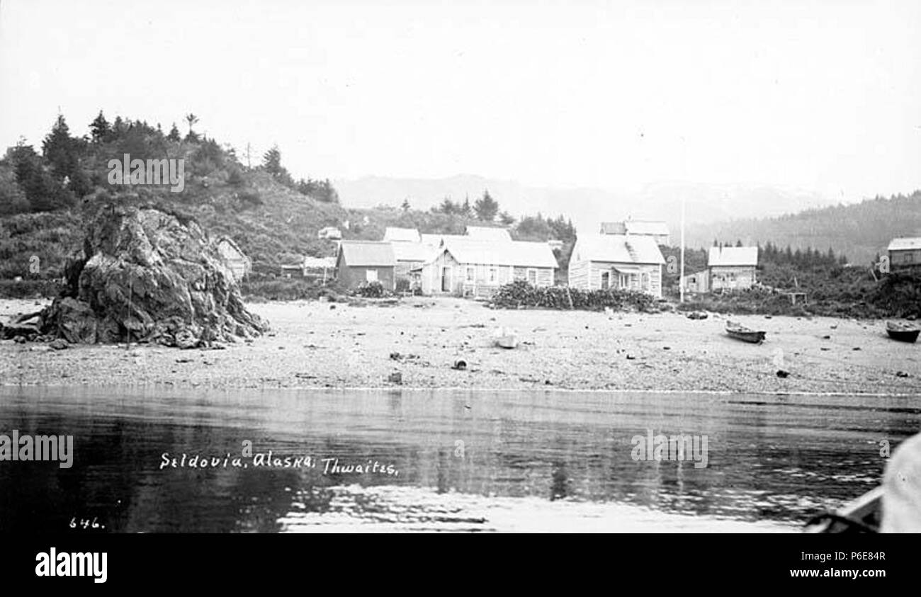 . English: Seldovia from the water, ca. 1912 . English: Caption on image: Seldovia, Alaska PH Coll 247.197 Seldovia is on the Kenai Peninsula across from Homer on the south shore of Kachemak Bay. Native residents are mixed Dena'ina Indian and Sugpiaq Eskimo (also known as Alutiiq). The name Seldovia is derived from 'Seldevoy' a Russian word meaning 'herring bay.' Between 1869 and 1882, a trading post was located here. A post office was established in 1898. the village developed around commercial fishing and fish processing. Subjects (LCTGM): Seldovia (Alaska); Cities & towns--Alaska; Kachemak  Stock Photo