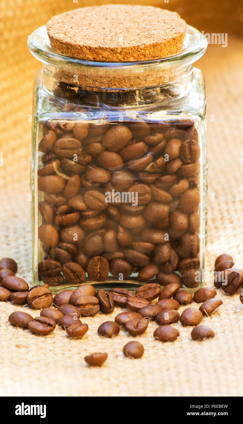 Roast coffee beans on burlap Stock Photo