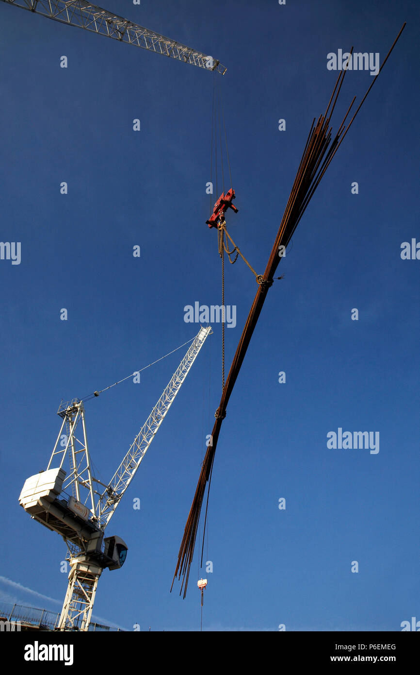 High rise crane seen here working construction building site in Leeds, Yorkshire Stock Photo Alamy