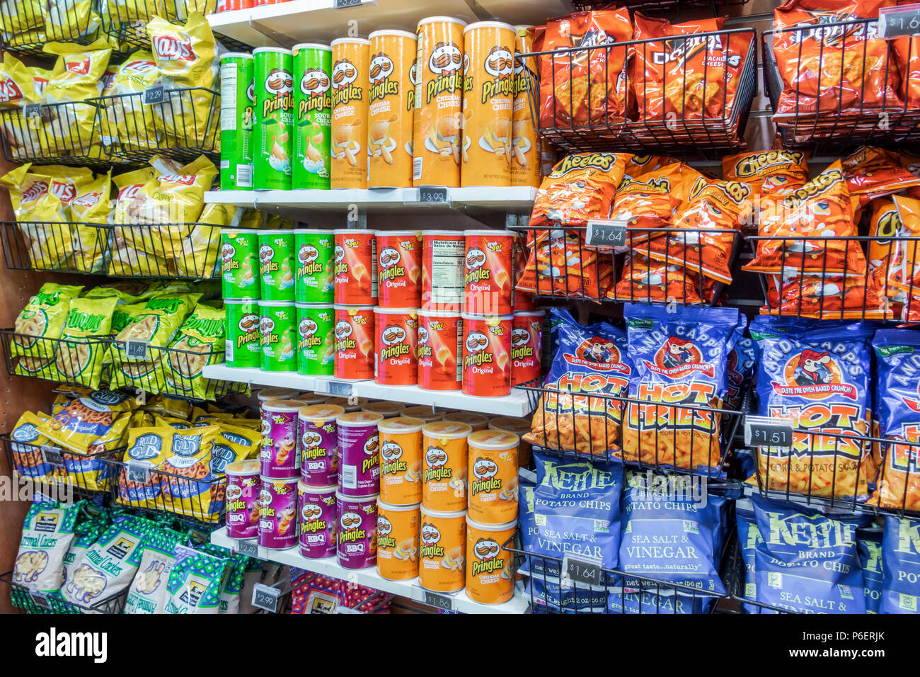 Florida,Fort Ft. Pierce,Florida's Turnpike toll road,rest stop,convenience store,snack junk food display sale,potato chips,Pringles,Cheetos,visitors t Stock Photo