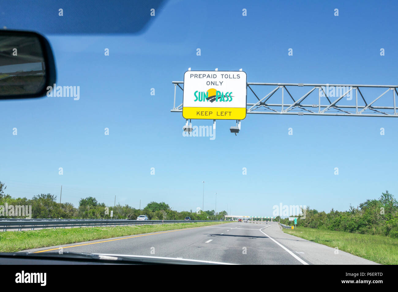Fort Ft. Lauderdale Florida,Florida's Turnpike toll road plaza,SunPass prepaid electronic toll collection system,traffic,lane sign,highway,visitors tr Stock Photo