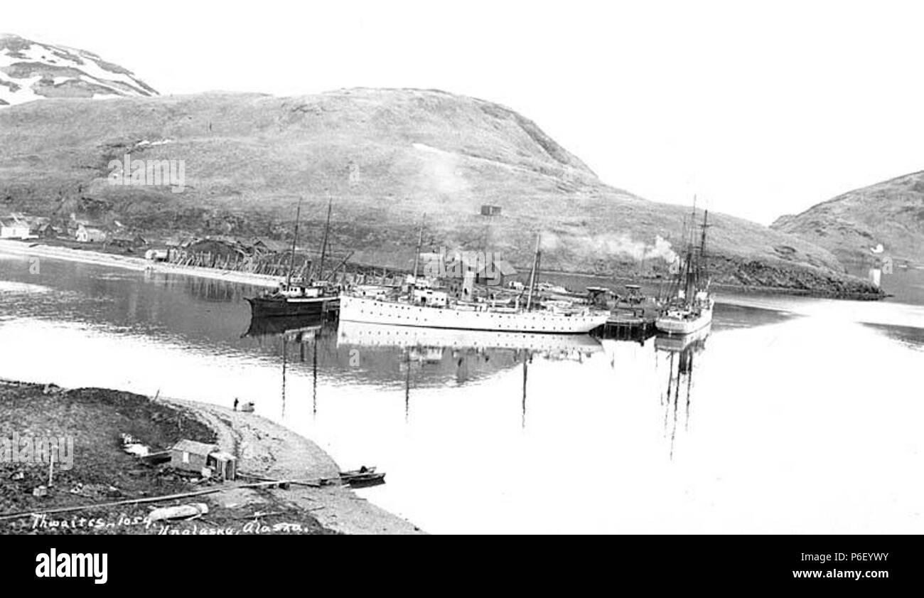 . English: Dock facilities, Unalaska, ca. 1912 . English: Caption on image: Unalaska, Alaska PH Coll 247.298 Subjects (LCTGM): Piers & wharves--Alaska--Unalaska; Iliuliuk Bay (Alaska); Ships--Alaska--Unalaska  . circa 1912 39 Dock facilities, Unalaska, ca 1912 (THWAITES 186) Stock Photo