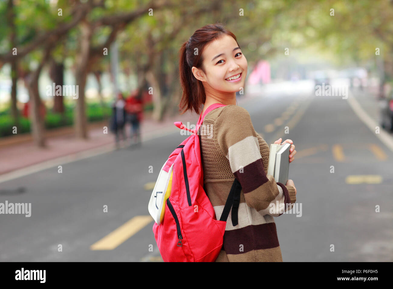 one female asian college student in campus Stock Photo - Alamy