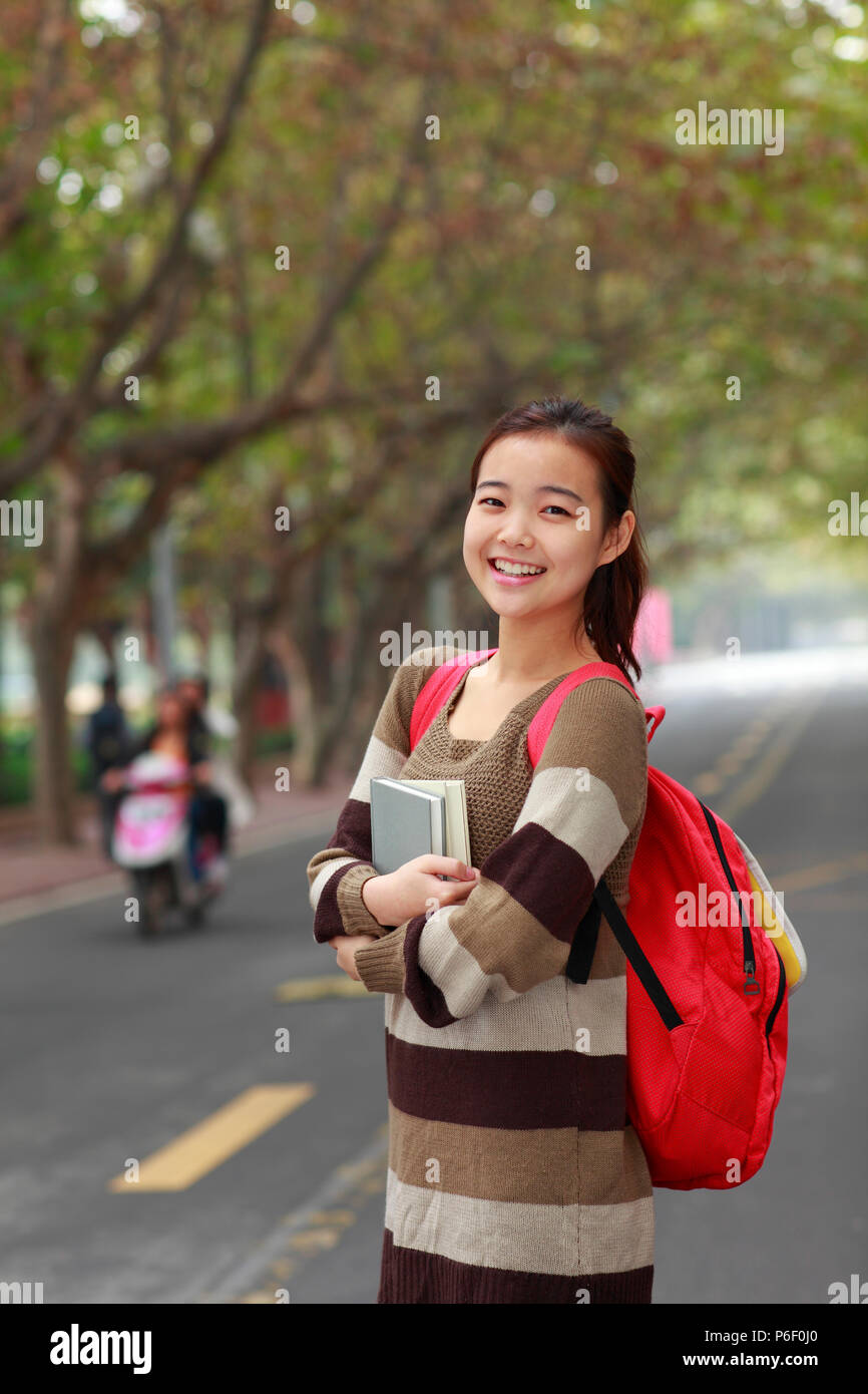 one female asian college student in campus Stock Photo - Alamy
