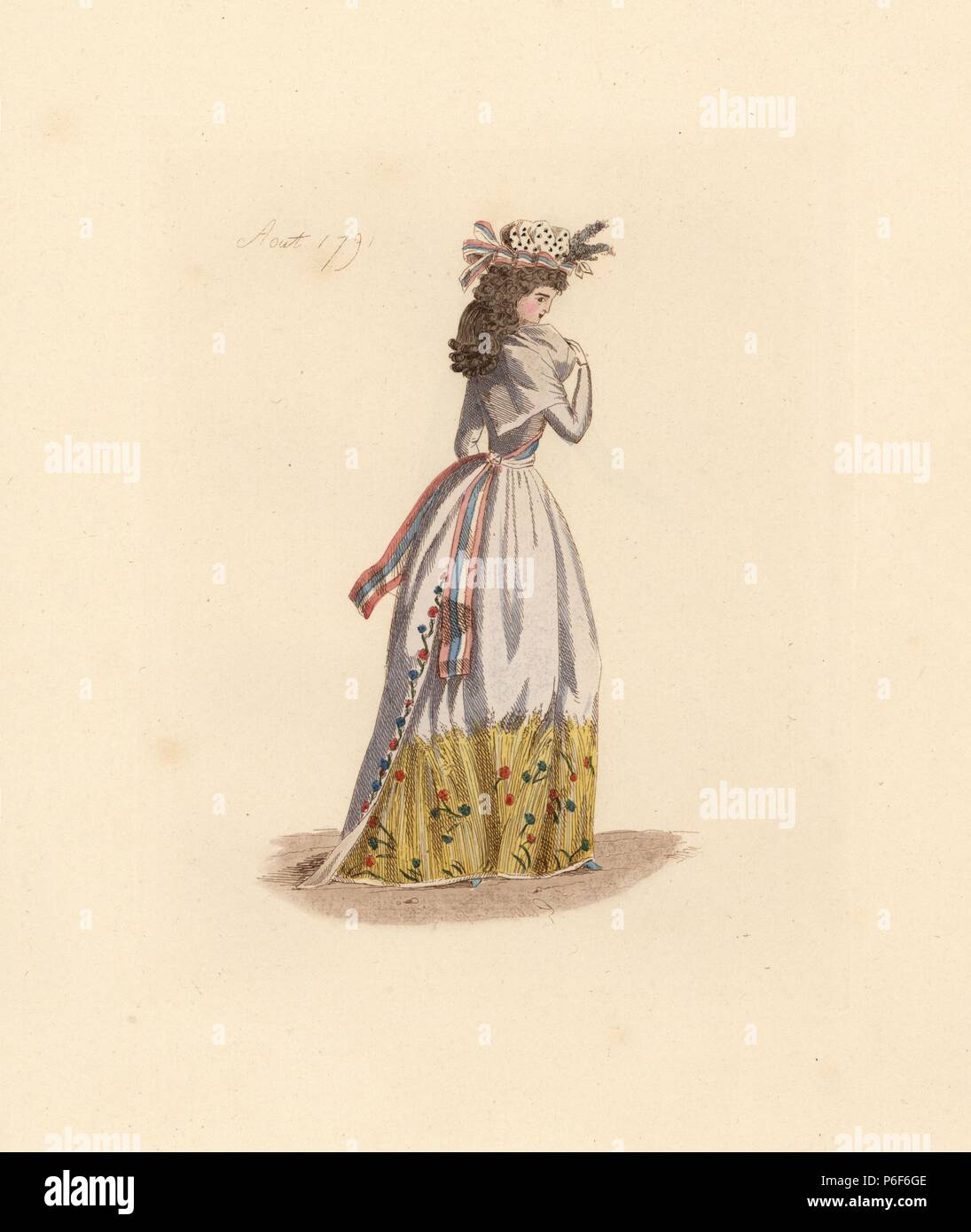 French woman wearing the fashion of August 1791. She wears a liberty cap with ribbons, large wig, fichu (neckerchief), redingote with tricolor ribbon, and embroidered petticoat. Handcoloured etching by Auguste Etienne Guillaumot Jr. from 'Costumes of the French Revolution, 1790-1793,' Bouton, New York, 1889. From the collection of contemporary costume prints of Victorien Sardou. Stock Photo