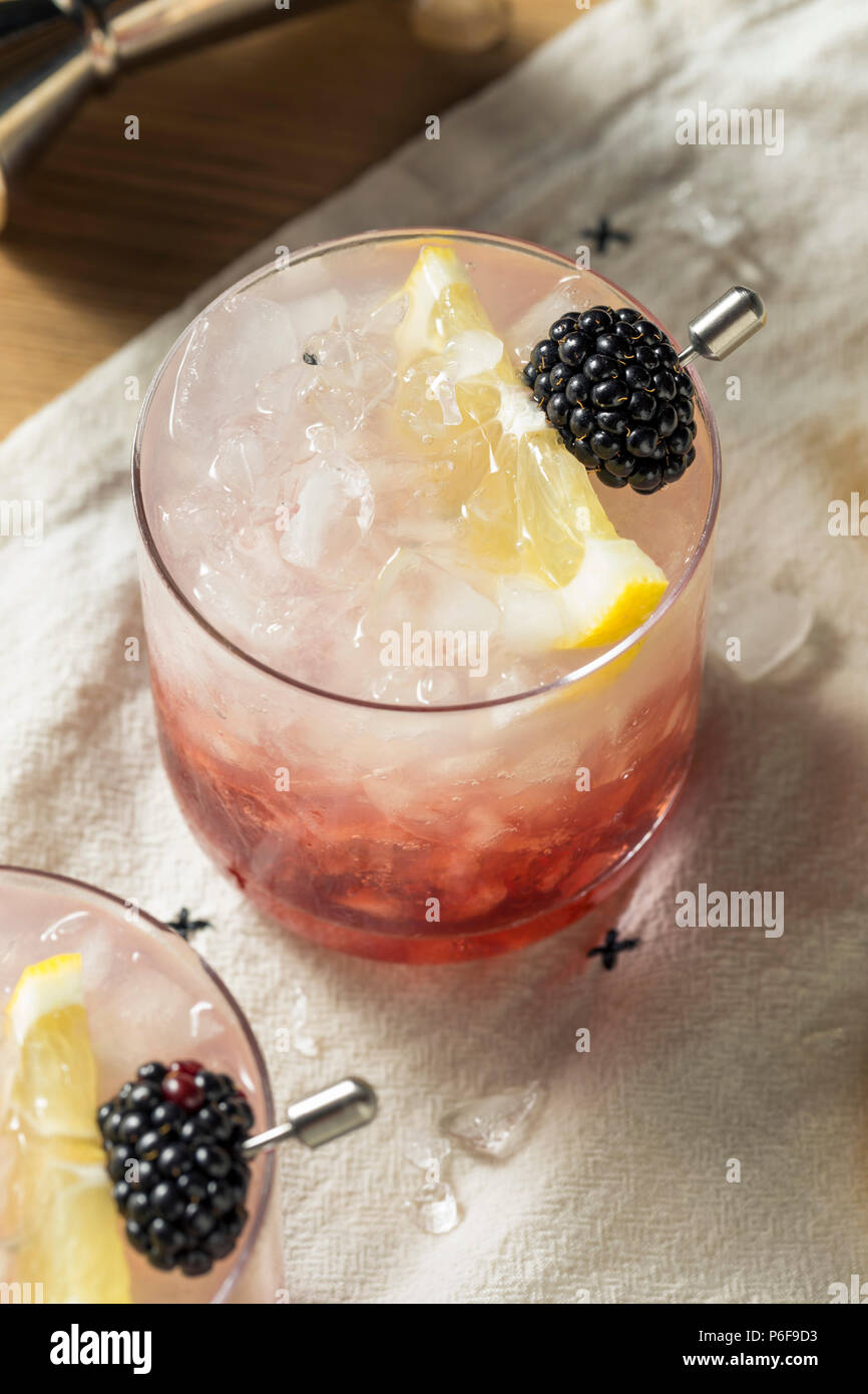 Alcoholic Blackberry Gin Bramble Cocktail with Lemon Stock Photo Alamy