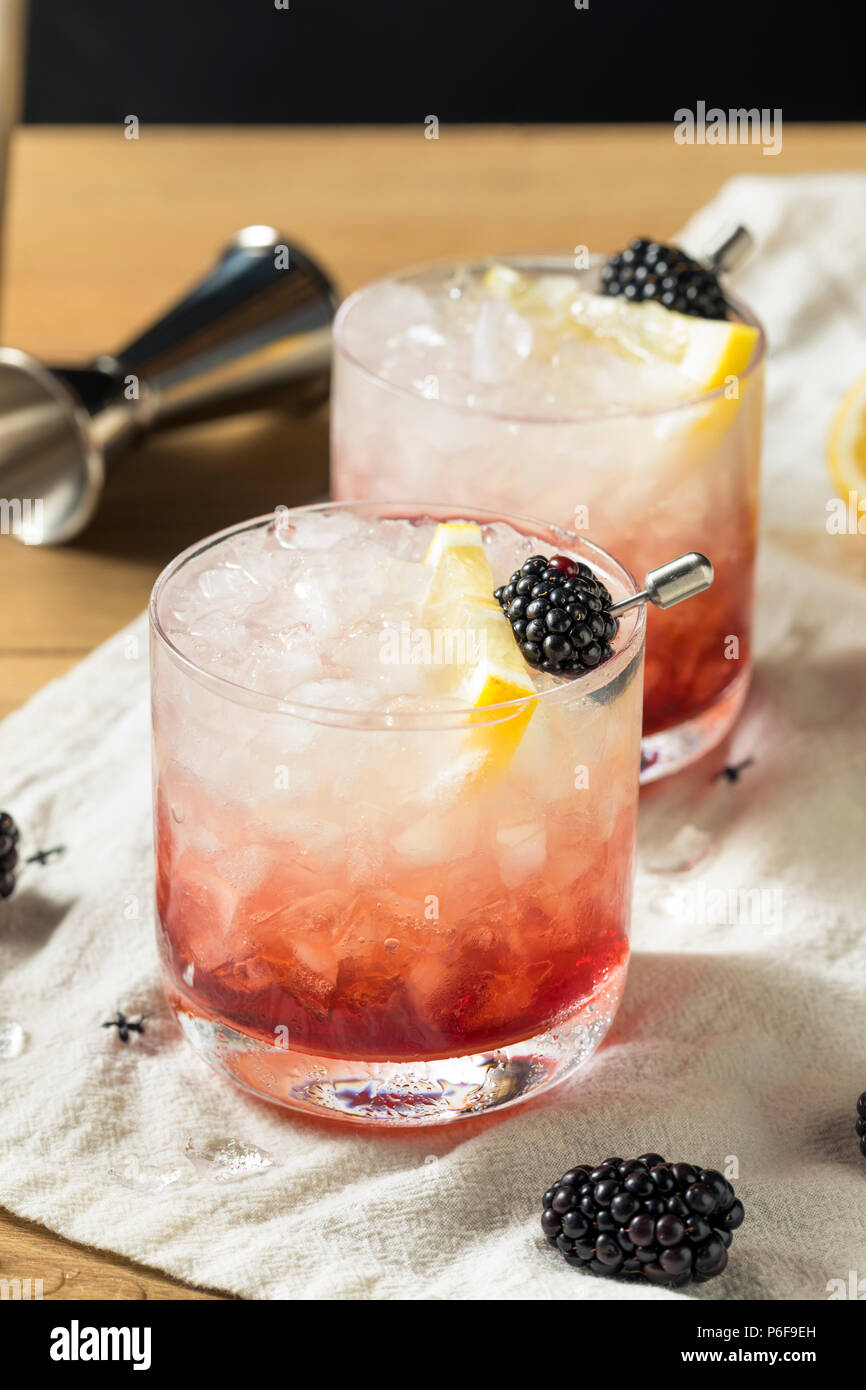 Alcoholic Blackberry Gin Bramble Cocktail with Lemon Stock Photo Alamy