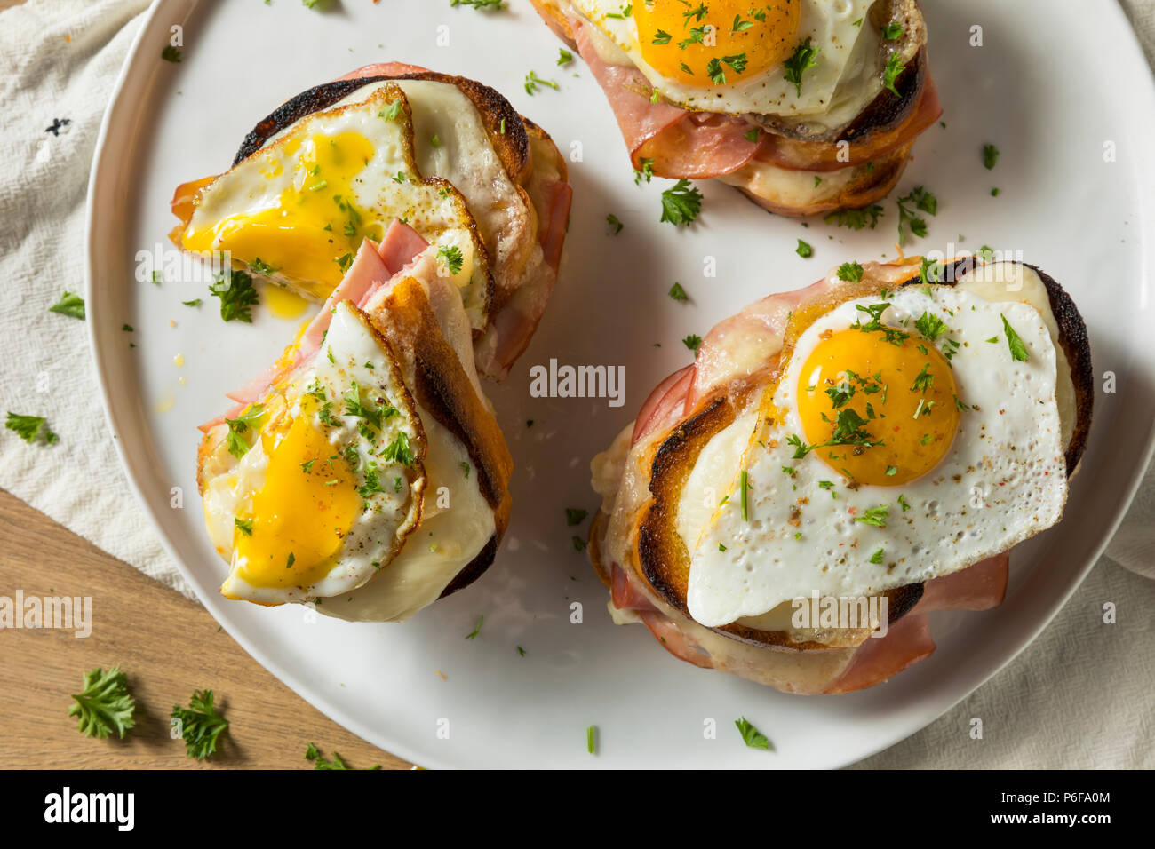 Homemade French Croque Madame Sandwich with Ham and Cheese Stock Photo