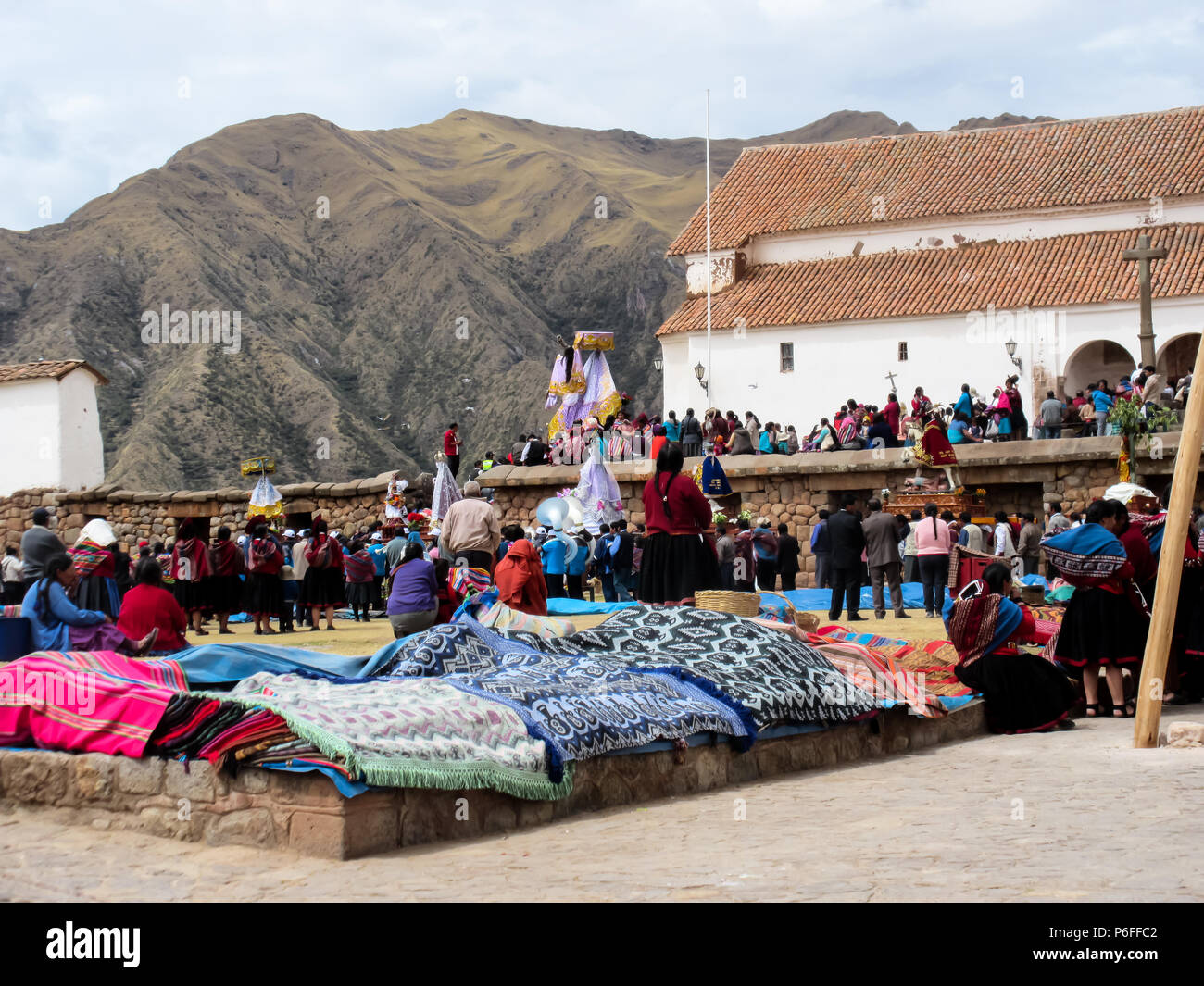 People of Chinchero gather in a plaza near to the Church during a traditional religious festival. Stock Photo