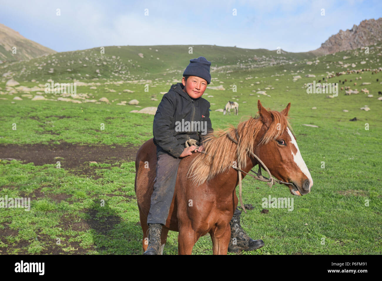 Kyrgyz horserider, Jyrgalan Valley, Kyrgyzstan Stock Photo