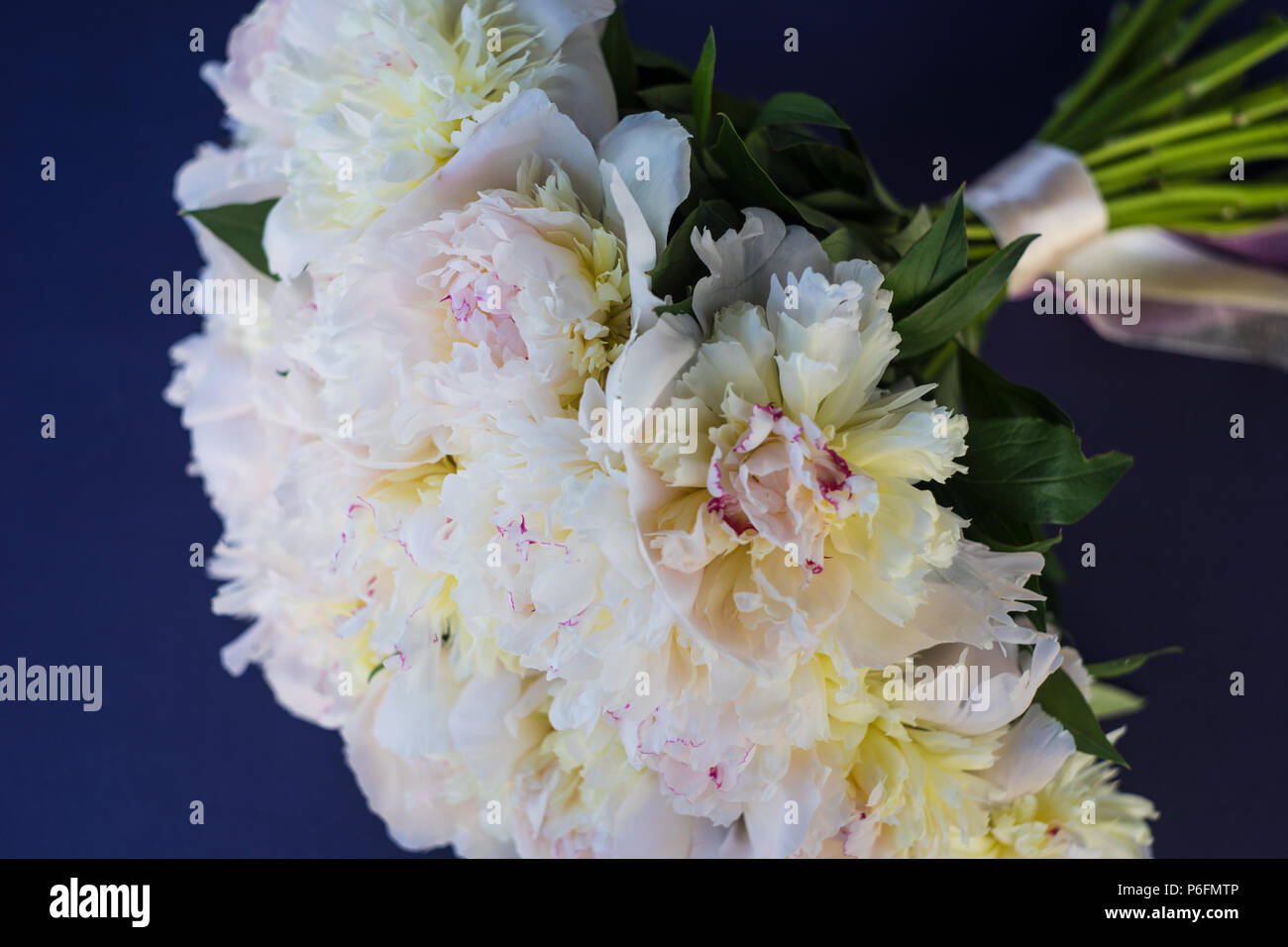 Beautiful bridal bouquet with white peony flowers Stock Photo - Alamy