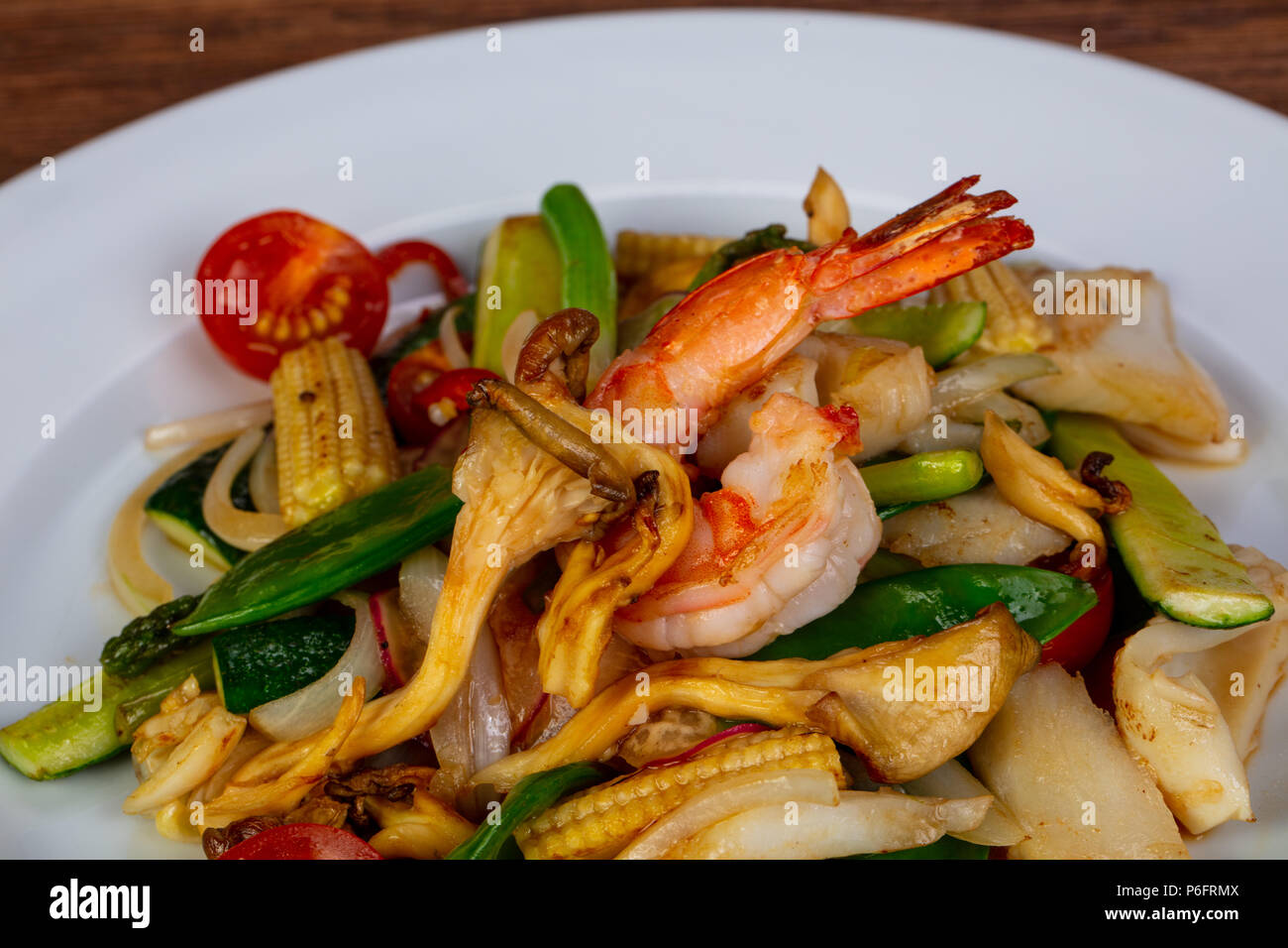 Stir fry with seafood and vegetables Stock Photo - Alamy