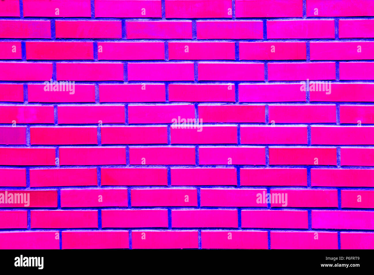 texture close-up of a pink brick wall, background image Stock Photo - Alamy