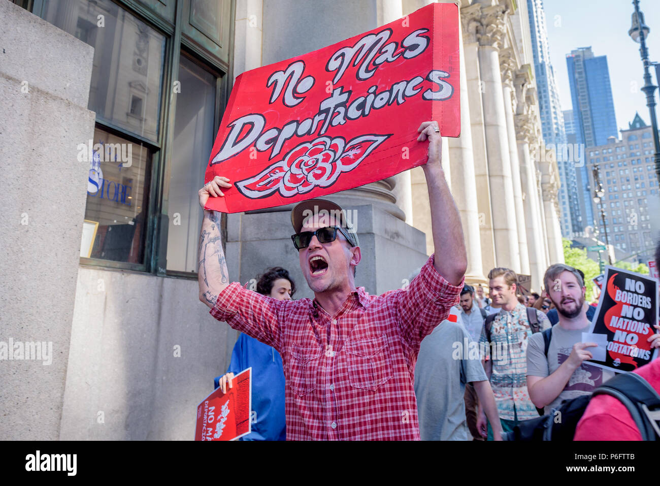 New York, United States. 29th June, 2018. The NYC Democratic Socialists of America organized the march to #AbolishICE. The march began at City Hall, walk past the Attorney General's Office, and end at 26 Federal Plaza-the site of ICE's Enforcement Removal Operations Office. Credit: Erik McGregor/Pacific Press/Alamy Live News Stock Photo