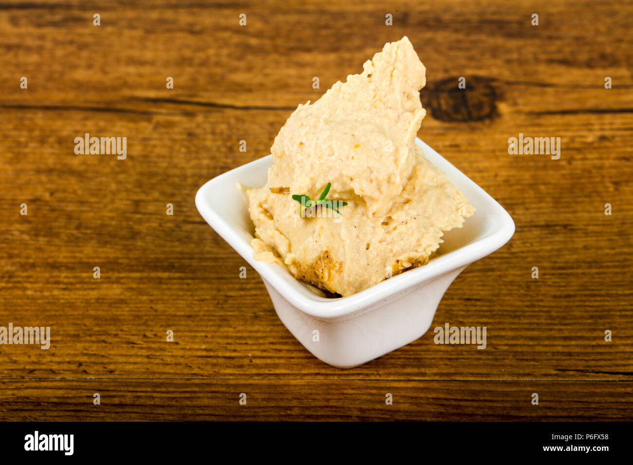Vegetarian Humus with sesame seeds and thyme leaves Stock Photo Alamy
