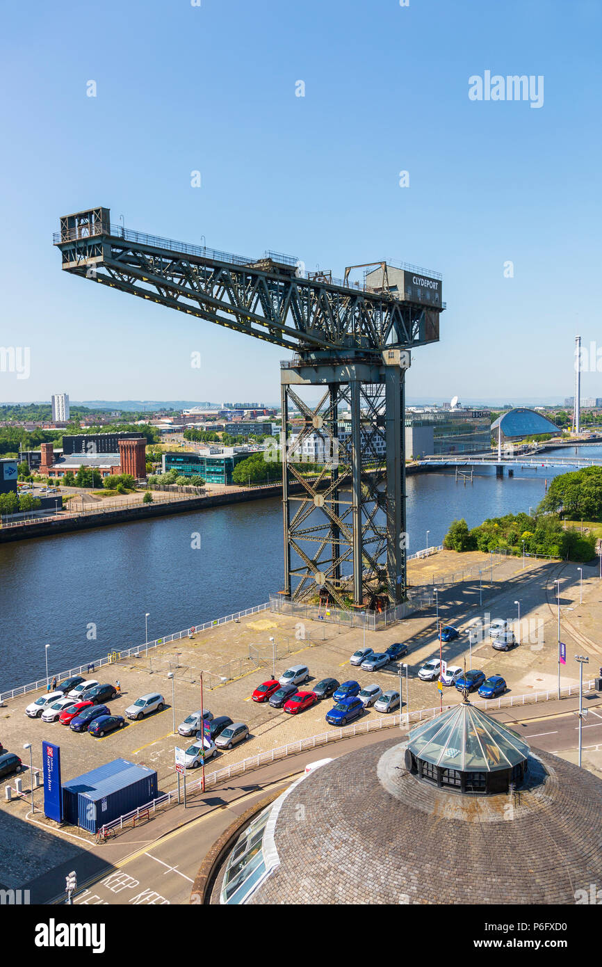 View west across the River Clyde to the Finnieston crane in Anderston, towards Govan District and BBC Scottish headquarters, Glasgow, Scotland Stock Photo