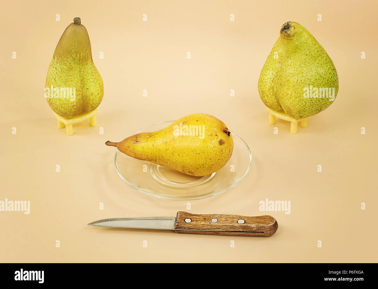 Sad farewell with the ripe pear Stock Photo