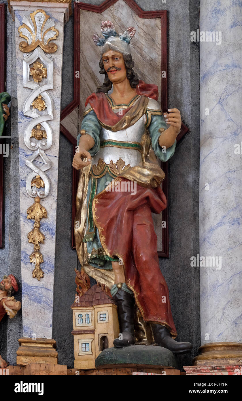 Statue of Saint Florian on the main altar in the Church of Assumption of the Virgin Mary in Pokupsko, Croatia Stock Photo