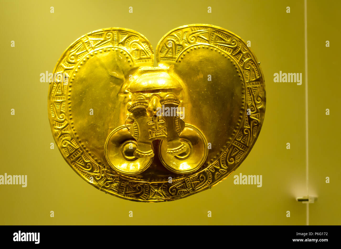 Yotoco period pre-Columbian gold object in exhibit at Pre-Columbian Gold Museum, Bogota Colombia Stock Photo