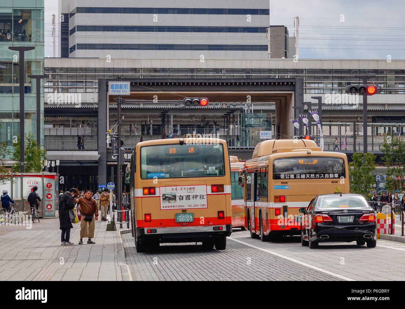 Himeji, Japan Dec 27, 2015. Local buses run on street in Himeji, Japan. Himeji known for the
