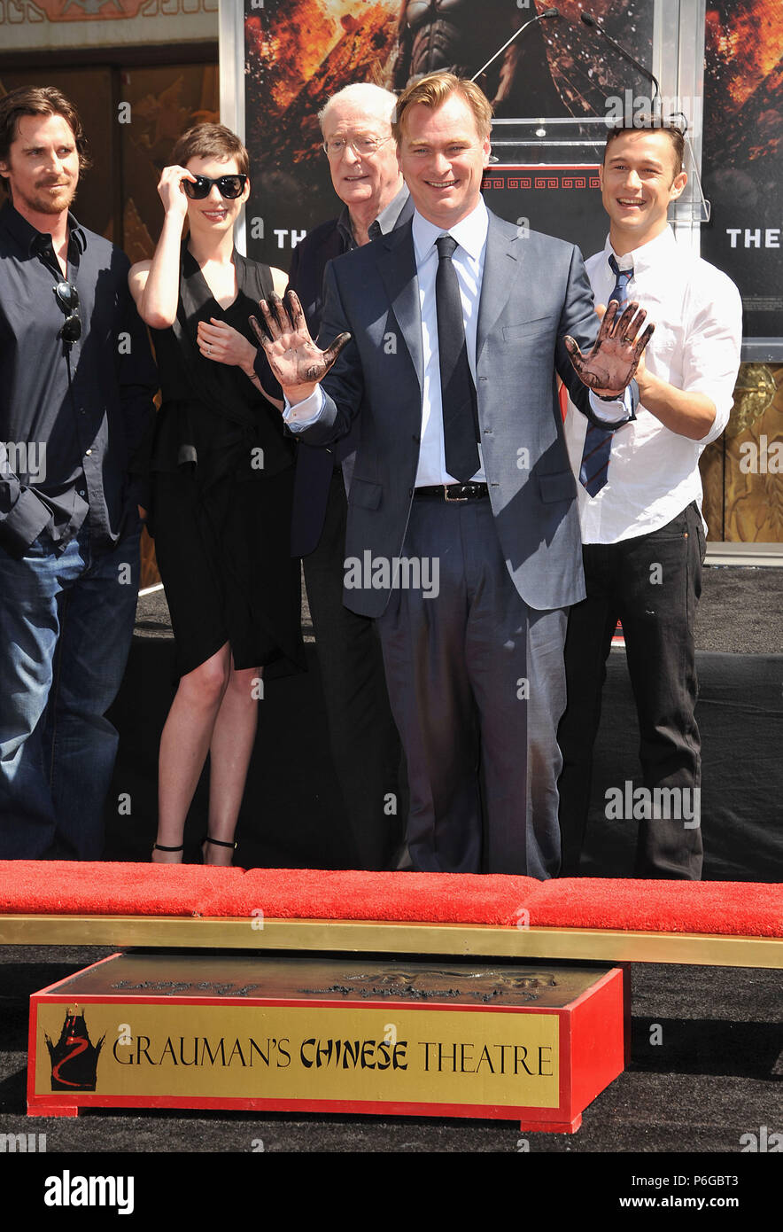 Christopher Nolan Honored with Hand and Foot Print Ceremony at the Chinese  Theatre In Los Angeles. the cast of Dark Knight Rises, Batman Gary Oldman,  Michael Caine, Anne Hathaway, Christian Bale, Joseph