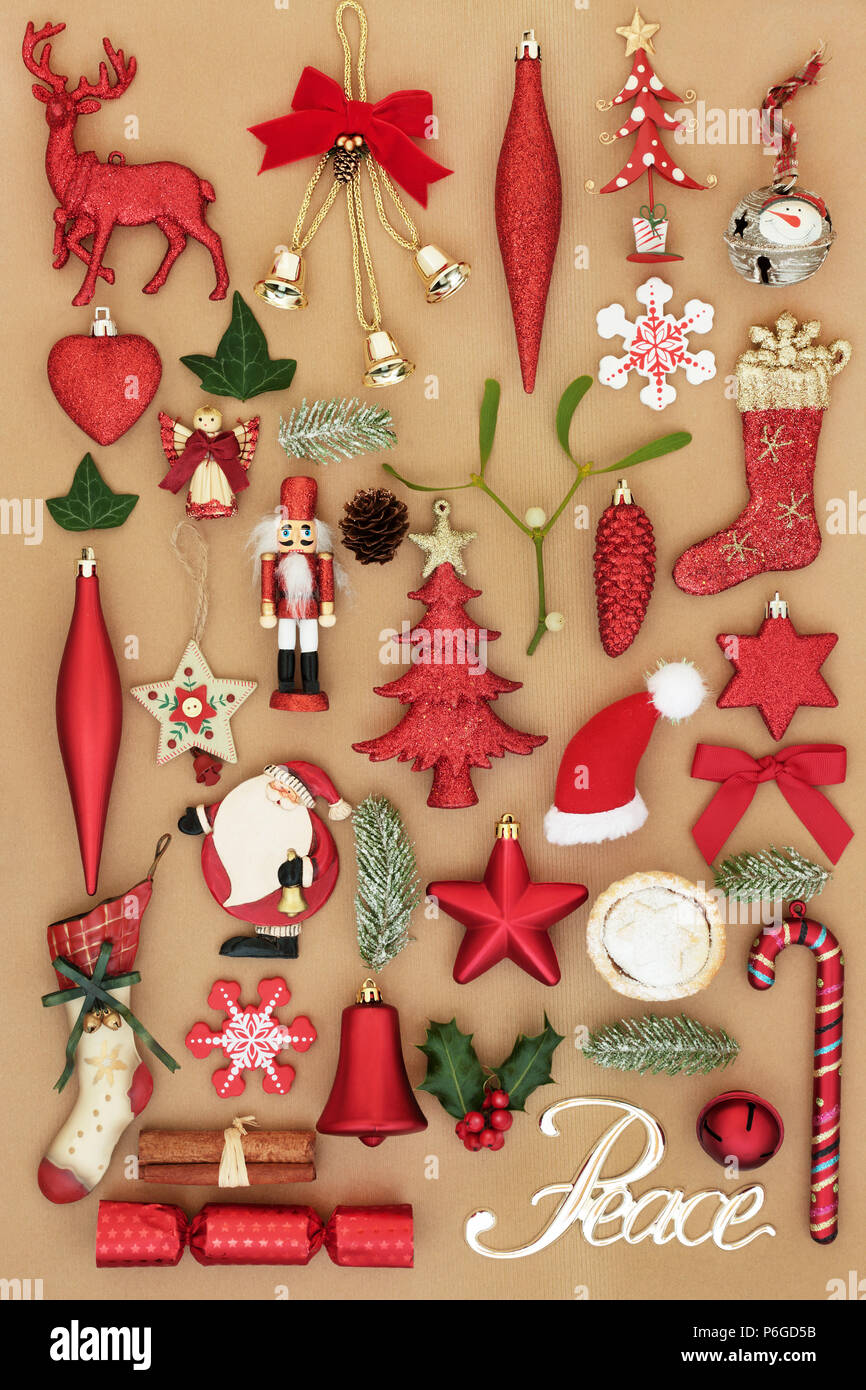 https://c8.alamy.com/comp/P6GD5B/christmas-old-fashioned-retro-tree-decorations-with-silver-peace-sign-ornaments-and-symbols-with-winter-flora-on-wrapping-paper-background-top-view-P6GD5B.jpg