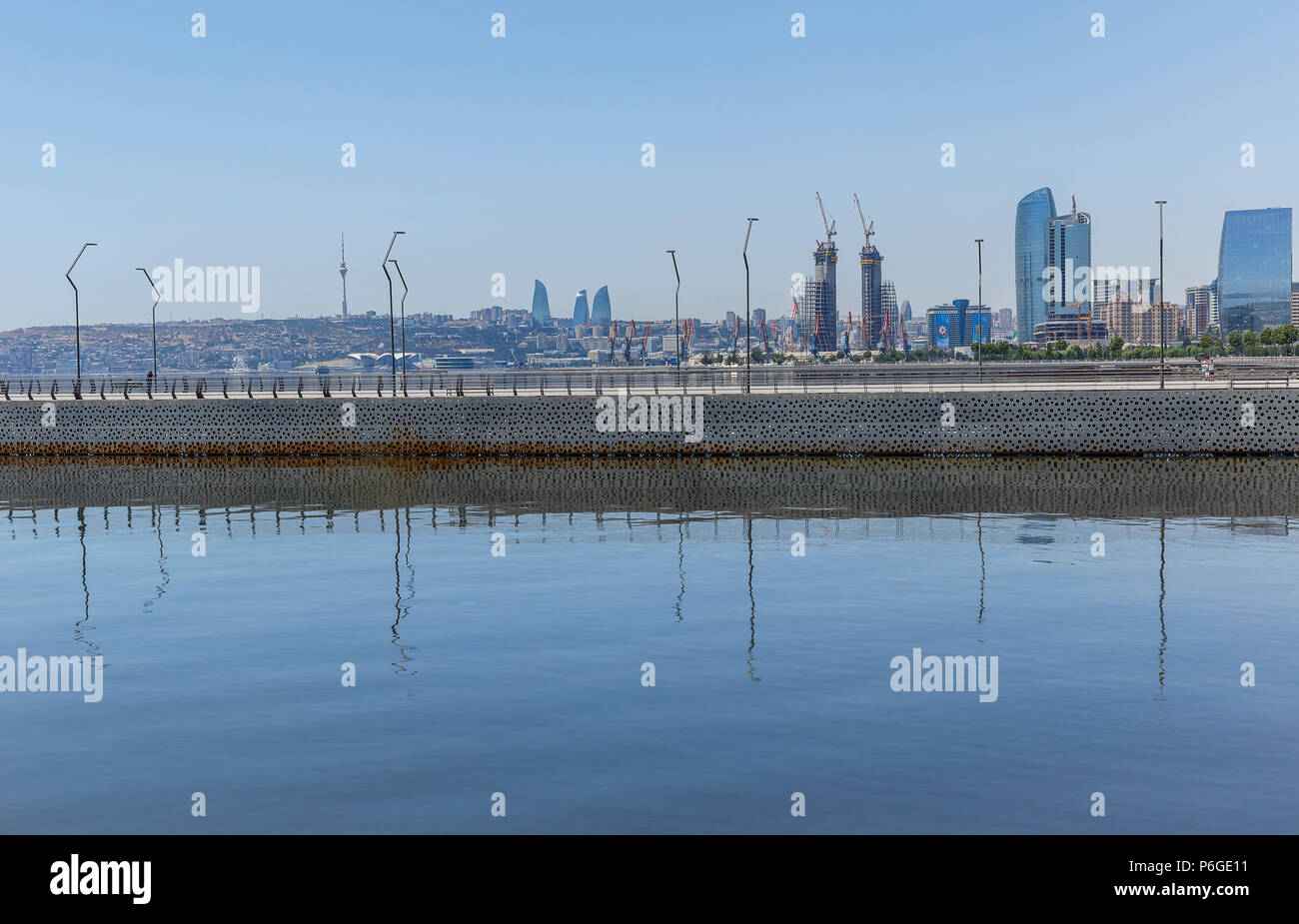 Reflection of buildings in the Caspian Sea in Baku Stock Photo