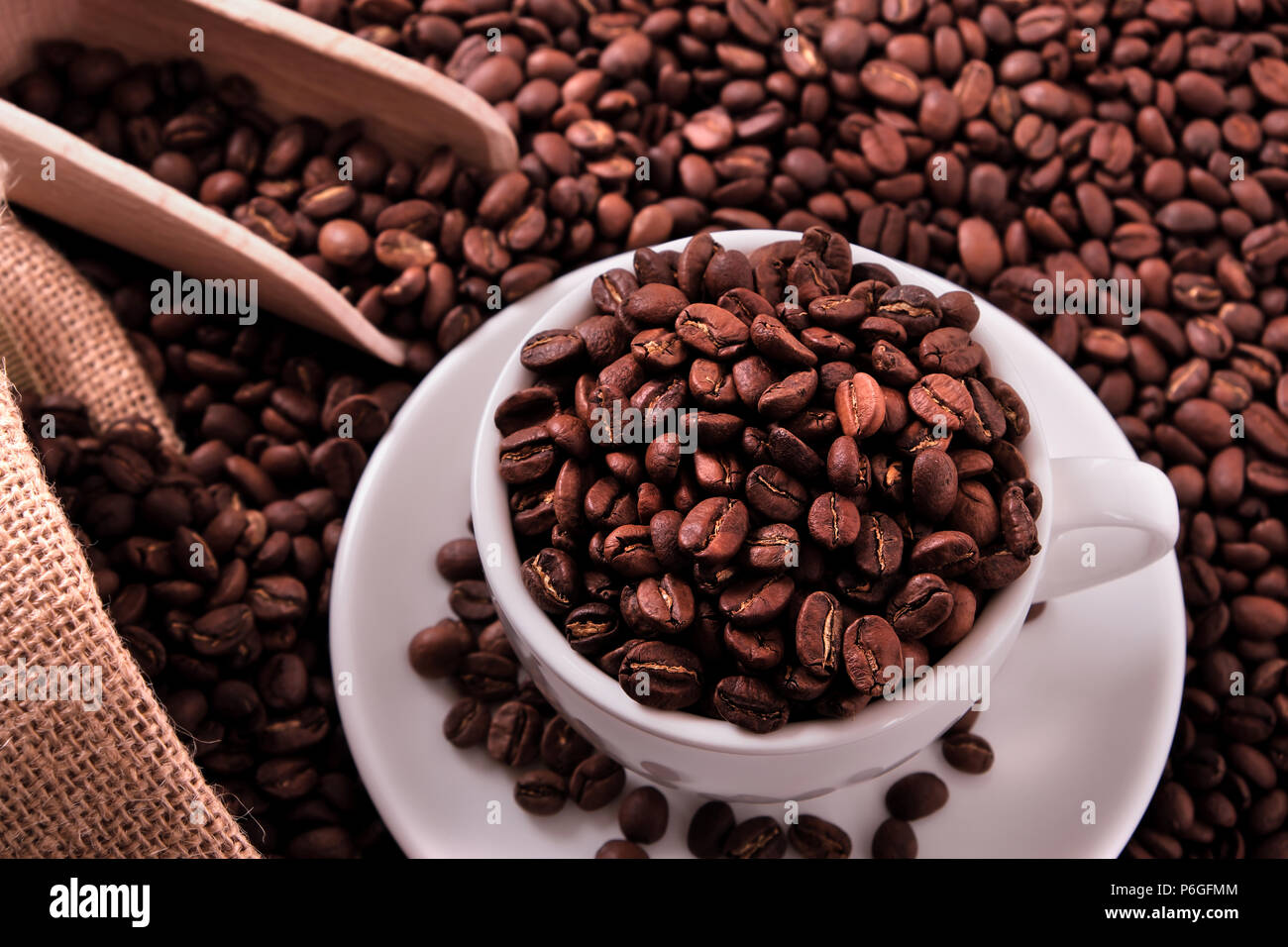 White coffee cup with beans sack and scoop Stock Photo