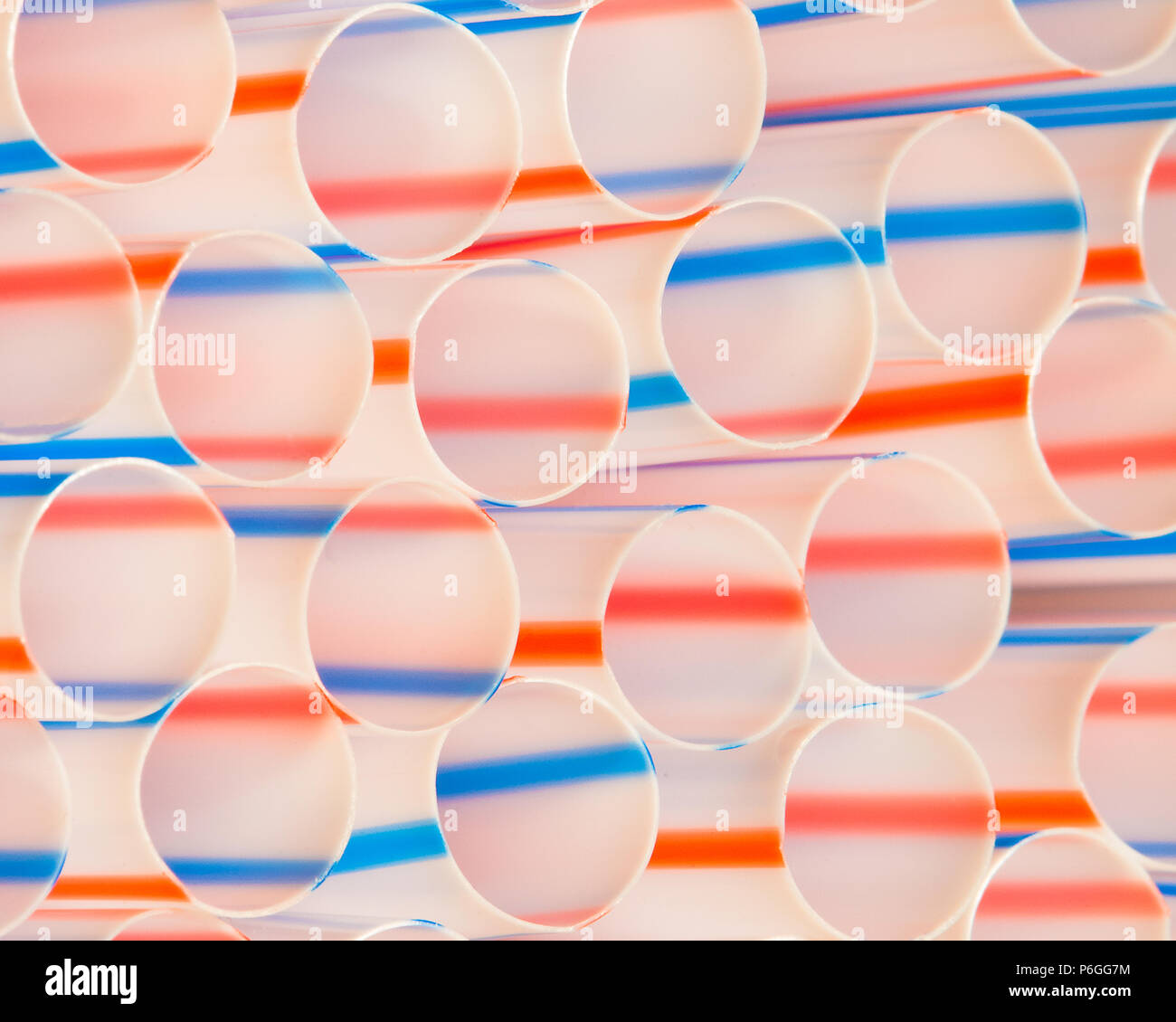 Red, white and blue straws form abstract pattern of ovals and lines Stock Photo