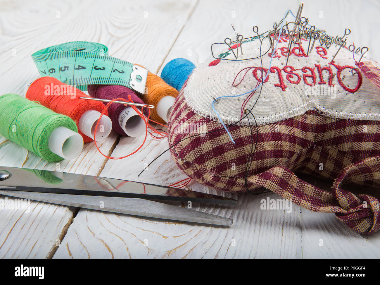 Tools for sewing- thread, scissors, pins Stock Photo