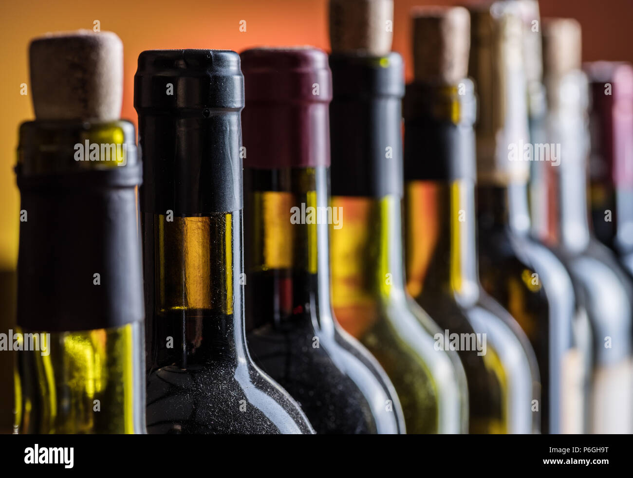 Line of wine bottles. Closeup Stock Photo Alamy