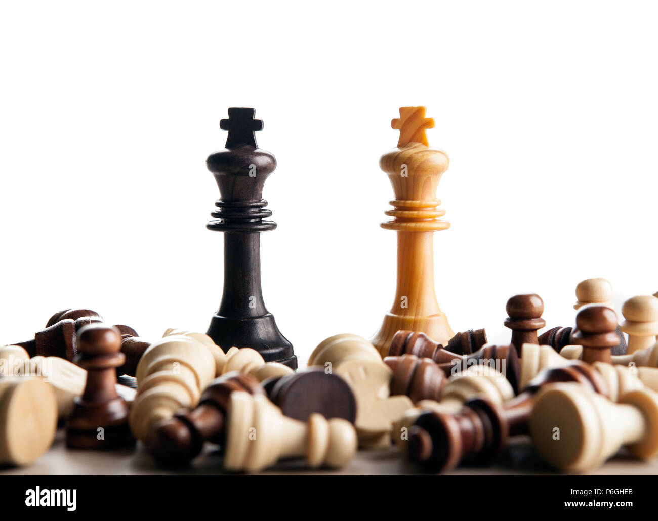 chess duel of two kings on a white background close up Stock Photo